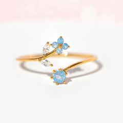RIN BLUE FLOWER CZ RING