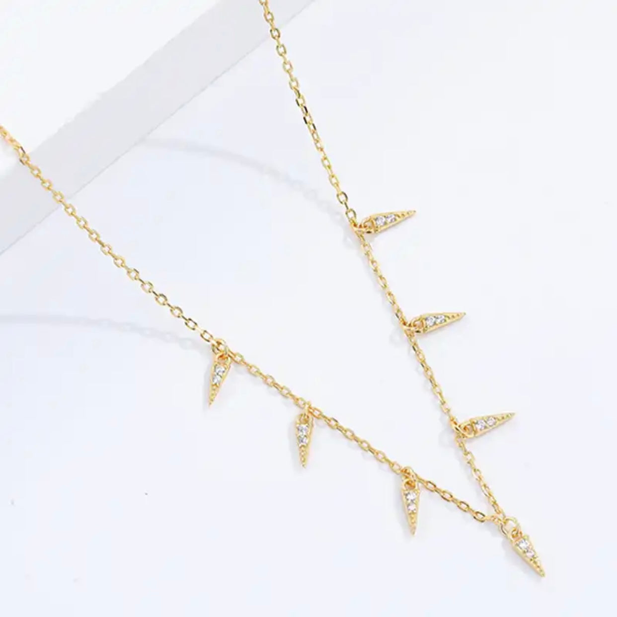 JIA STERLING SILVER TASSEL CHARM NECKLACE