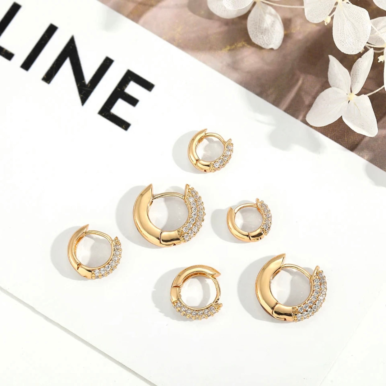 NOEMIE BLING CZ HUGGIE EARRINGS