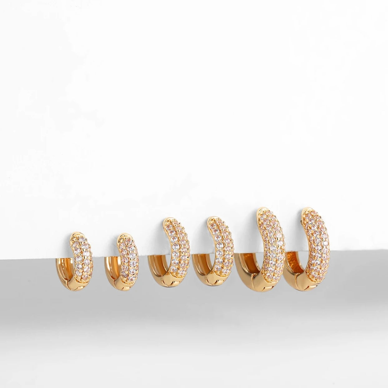 NOEMIE BLING CZ HUGGIE EARRINGS