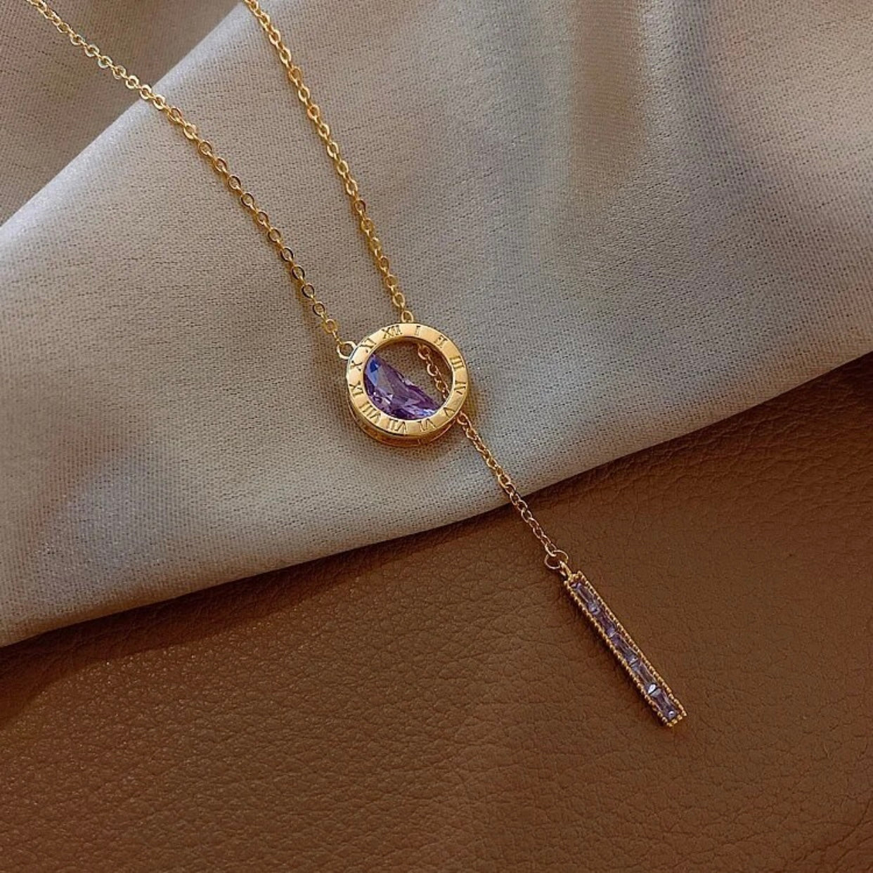 PAOLA ROMAN NUMERAL LARIAT NECKLACE