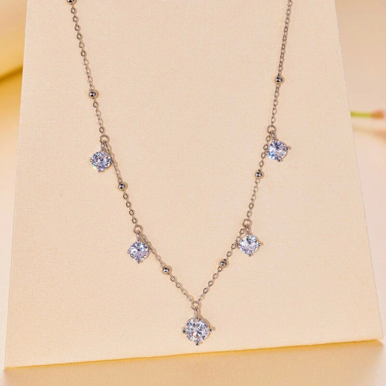 ABELIA STERLING SILVER MOISSANITE CHARM NECKLACE