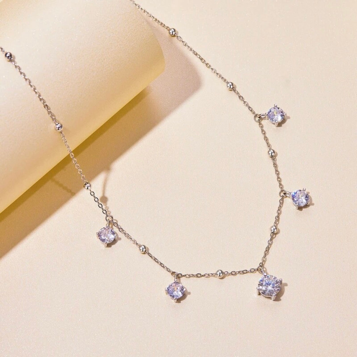ABELIA STERLING SILVER MOISSANITE CHARM NECKLACE