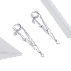 PORTIA STERLING SILVER MOON AND STARS TASSEL EARRINGS