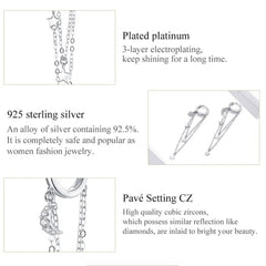 PORTIA STERLING SILVER MOON AND STARS TASSEL EARRINGS