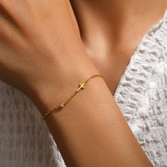 ARYA STERLING SILVER CROSS BRACELET