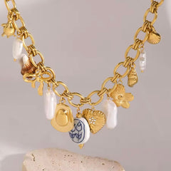 ARIEL SHELL CHARM NECKLACE