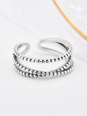 LUCREZIA TWIST STERLING SILVER BEAD RING